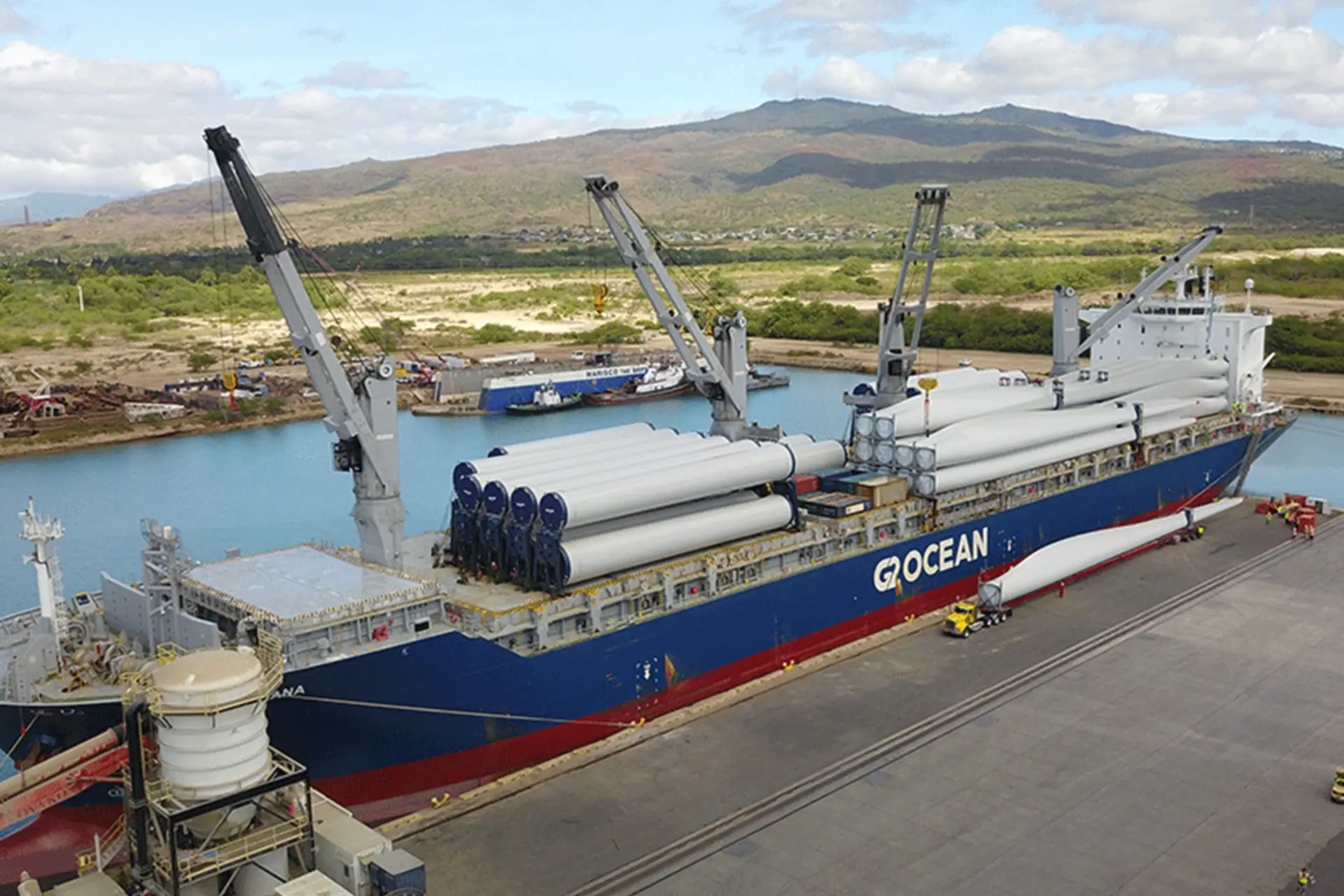 ship loaded with heavy equipment at port